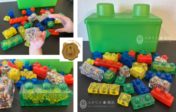 はじめてのブロック遊びにおすすめ！ 安全性と学びの効果を兼ね備えた、18ヶ月から遊べる “ジェリーブロックス” ジェリーブロックスは、今までのブロックとは違う、新しいアイディアの知育玩具です。 やわらかいブロックの中に砂やビーズなどのいろいろな素材が入っていて、ブロック遊びの楽しさだけでなく、触感の違いを楽しみながら子どもたちの感覚を育むことができます。 18ヶ月からの「はじめてのブロック」として、安全性と学習効果を兼ね備えた新しい選択肢を提供します。 踏んでも痛くない！やわらかブロック 柔らかい素材を使用しているため踏んでも怪我をしにくく安全だから、はじめてのブロック遊びにおすすめです。 ブロックをねじったり握ったり、楽しく遊びながら子どもたちの握力向上をサポートします。 指先の運動は脳に、握力の向上は体力や学力にも良い影響を与えると言われていてます。 中身が見える 透明ブロックの中には砂やビーズなど全部で５種類の素材が入っていて、見た目も楽しく、いろんな感触を楽しめます。 音も楽しい♪ ASMR動画がSNSで話題！ ぺりっと外す感触と不思議な音を楽しもう！ 洗えるから清潔 40℃以下のぬるま湯と洗剤で洗うことができるから、はじめてブロックで遊ぶ小さなお子様にも安心。 ジェリーブロックス ジェリーブロックス ベーシック（20ピース） ジェリーブロックス ジェリーブロックス ベーシック（20ピース） ジェリーブロックス のりものセット（35ピース） ジェリーブロックス ジェリーブロックス のりものセット（35ピース） ジェリーブロックス ボックスセット（30ピース） ジェリーブロックス ジェリーブロックス ボックスセット（30ピース） ジェリーブロックス スターター（11ピース） ジェリーブロックス ジェリーブロックス スターター（11ピース）